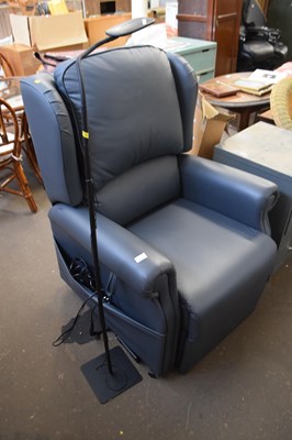 Lot 773 - A leather motorised recliner chair with...