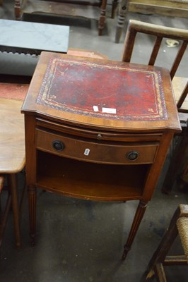 Lot 784 - A leather topped bedside cabinet