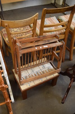 Lot 803 - A small tile topped table and a wooden plate rack