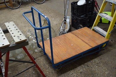 Lot 1085 - A flat bed porters trolley