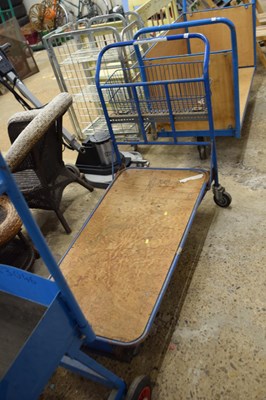 Lot 1089 - A flat bed porters trolley