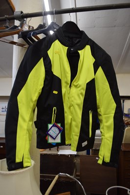 Lot 824 - A fluorescent thermal lined motorbike jacket,...