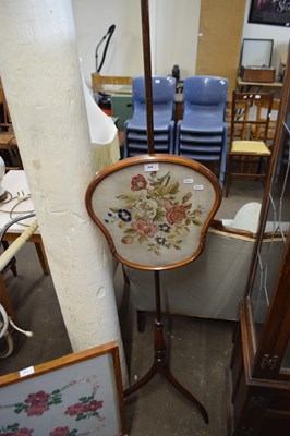 Lot 844 - A pole screen with floral tapestry panel