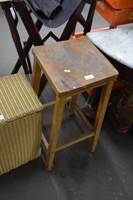 Lot 875 - A hardwood stool