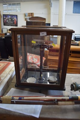 Lot 894 - Chemists precision beam scales in glass cabinet