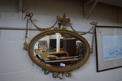 Lot 903 - Georgian style oval bevelled wall mirror in...