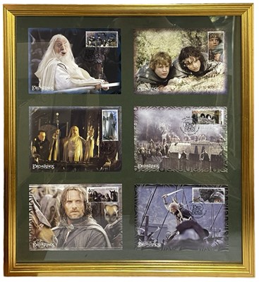 Lot 80 - A framed and glazed collection of Lord of the...