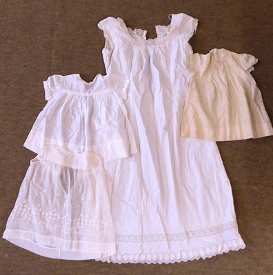 Lot 153 - An early 20th century cotton nightgown,...