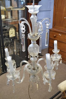 Lot 392 - A 20th Century clear glass chandelier with...