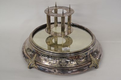 Lot 428 - A large silver plated mirrored cake stand of...