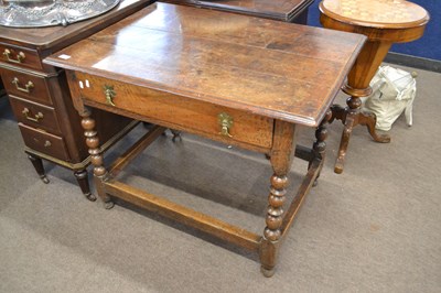 Lot 429 - An 18th Century oak side table with single...