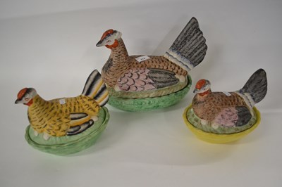 Lot 274 - Group of three Staffordshire egg covers, all...