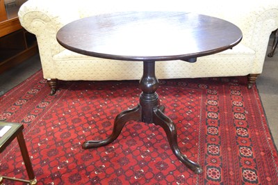 Lot 477 - A Georgian oak supper table with circular top,...