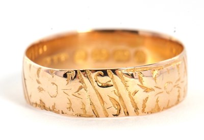 Lot 27 - A late Victorian 18ct gold ring, with chased...