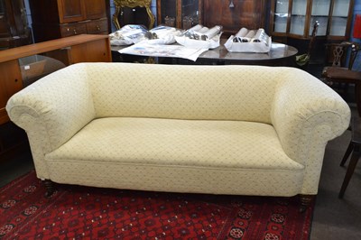 Lot 502 - A Victorian sofa upholstered in cream...