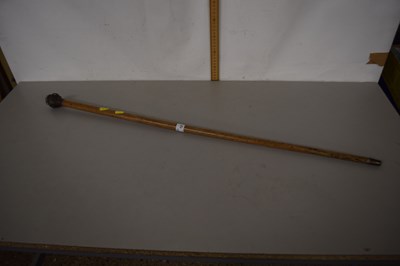 Lot 12 - A novelty walking cane with base metal top