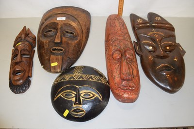 Lot 128 - Group of five various wooden wall masks