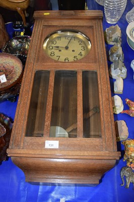 Lot 131 - Early 20th Century oak cased wall clock