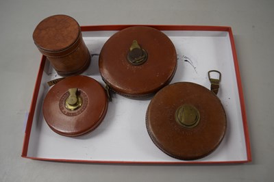 Lot 158 - Mixed Lot: Vintage leather cased tape measures...