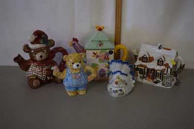 Lot 199 - Group of four novelty teapots plus a further...