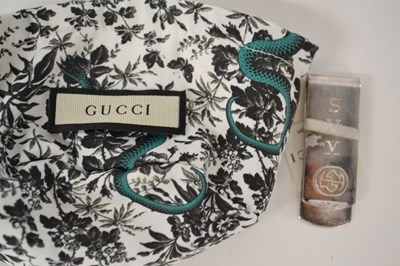 Lot 325 - A Gucci money clip with original tag and bag