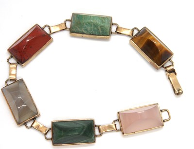 Lot 112 - A gemset bracelet, the rectangular sugar loaf...