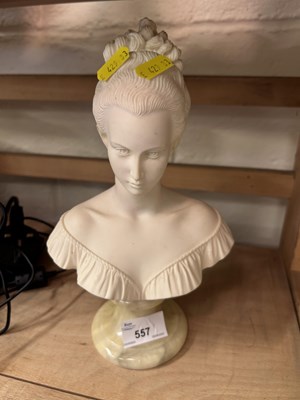 Lot 557 - Composition bust of a young lady