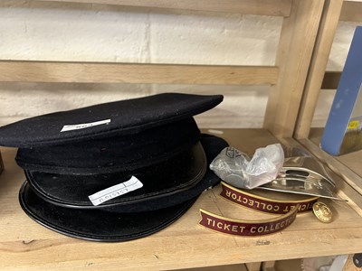 Lot 563 - Two vintage railway ticket collectors hats...