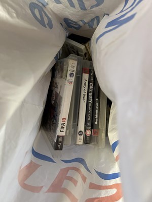 Lot 600 - Bag of Playstation games, cassettes etc