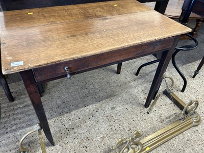 Lot 310 - Late 19th Century single drawer oak writing table