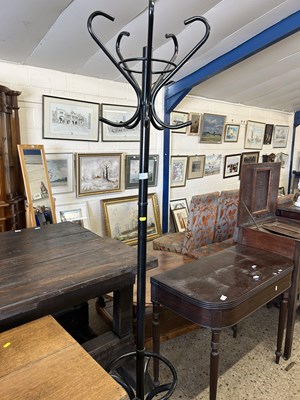 Lot 312 - A metal coat stand