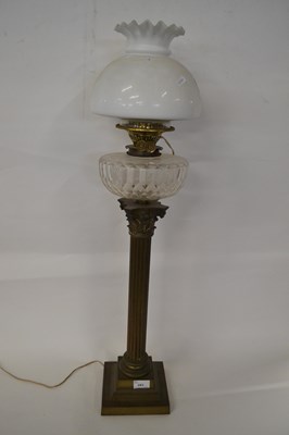 Lot 283 - An oil lamp with brass corinthian column and...