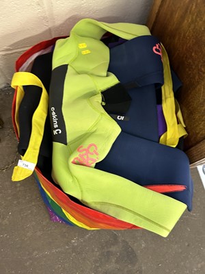 Lot 736 - Bag containing various wetsuites etc