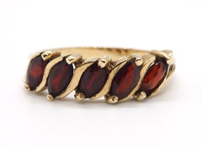 Lot 12 - A 9ct five stone garnet ring, set with five...