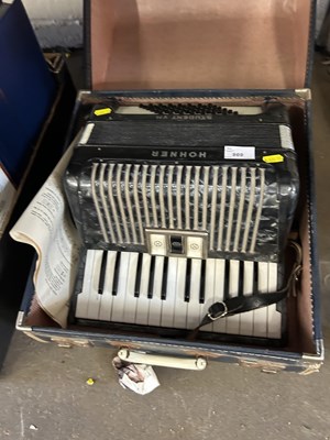 Lot 869 - A Hohner student VM accordion in case