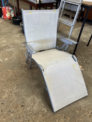 Lot 1037 - A folding garden lounger