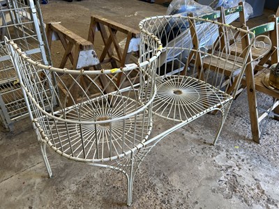 Lot 1057 - A metal garden bench