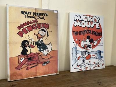 Lot 702 - Two reproduction prints on canvas, Donald Duck...