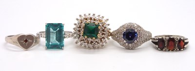 Lot 174 - A group of silver and CZ rings: to include a...