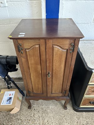 Lot 385 - A late 19th Century mahogany music cabinet...