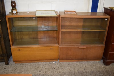 Lot 299 - Two similar mid Century oak veneered bookcase...