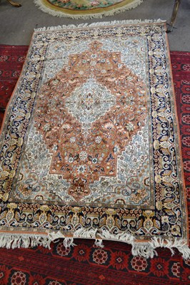 Lot 381 - A 20th Century Kashmiri silk mix rug with...