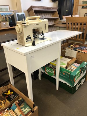 Lot 776 - New Home sewing machine folds away neatly into...