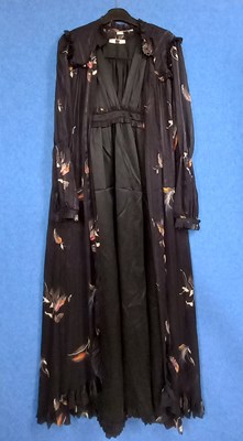 Lot 82 - A black dress and chiffon coat cover with...