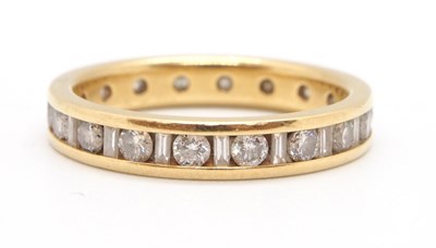 Lot 56 - An 18ct diamond eternity ring, the full hoop...