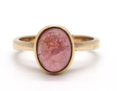 Lot 79 - A 9ct pink tourmaline ring, the oval pink...