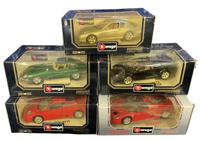 Lot 74 - A collection of boxed Bburago model cars, to...