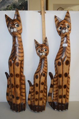 Lot 17 - Three wooden model cats