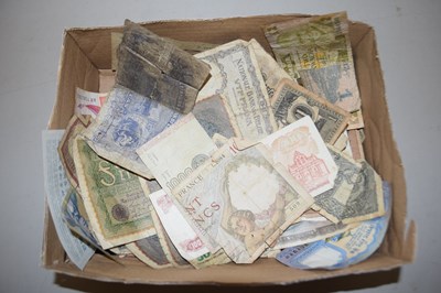 Lot 62 - A box of world bank notes in heavily...