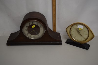 Lot 97 - A dome topped mantel clock in dark wood case...